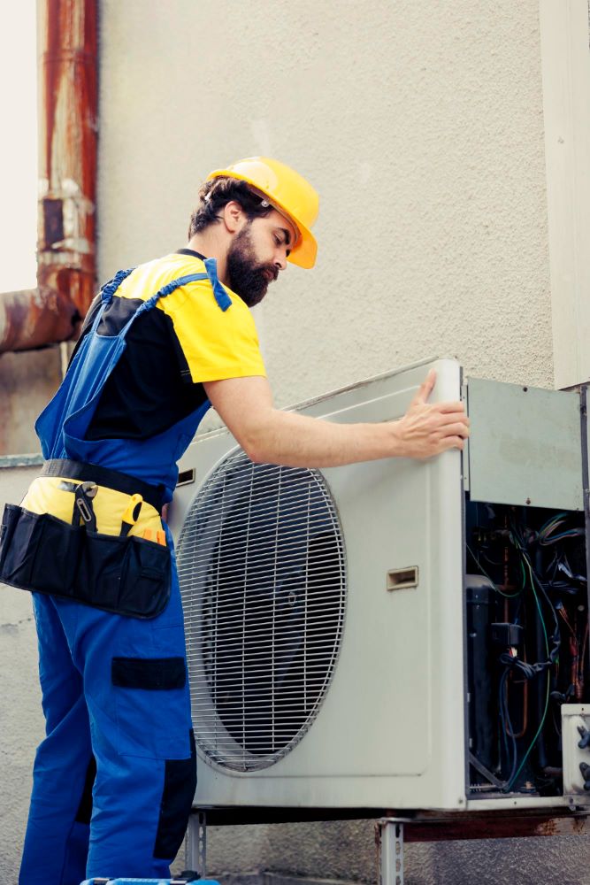 AC Technician at Work